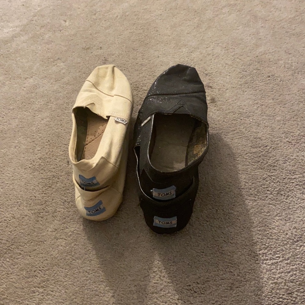 Two pairs of Toms, black and cream